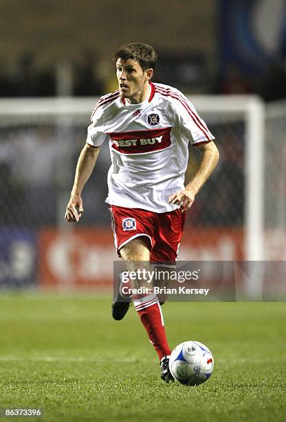 Brandon Prideaux of the Chicago Fire moves the ball up the field during the second half against Club America at Toyota Park on April 29, 2009 in...