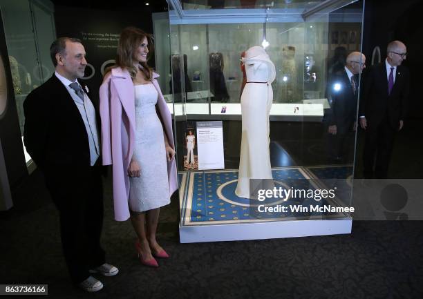 First lady Melania Trump and fashion designer Herve Pierre, Director of the National Museum of American History John Gray, and Secretary of the...