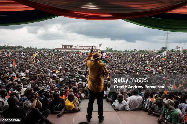 Opposition candidate Raila Odinga speaks to the crowd gathered at a rally at the Ogango Grounds on October 20, 2017 in Kisumu, Kenya. Tensions are...