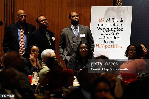 About 100 researchers, public officials, activists, community leaders and others participate in a town hall meeting focused on HIV/AIDS infection in...