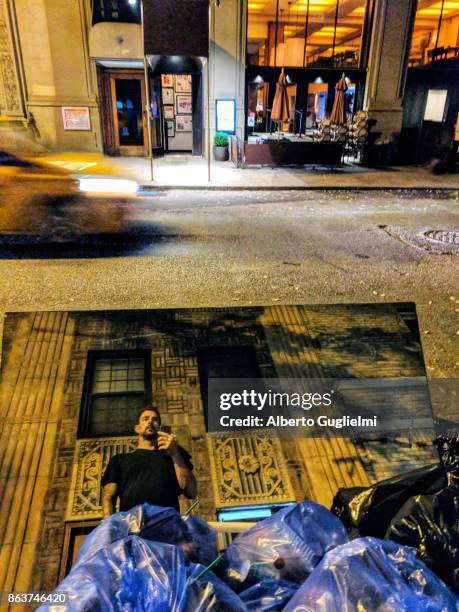 new york streets, taxi and broken mirror in the garbage reflection of a man - alberto guglielmi stock pictures, royalty-free photos & images