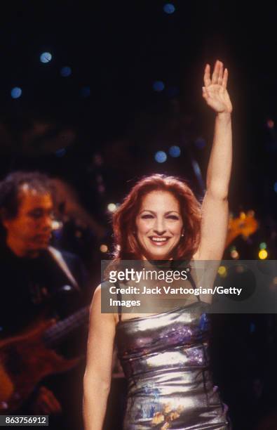 Cuban-born American Pop musician Gloria Estefan waves from the stage during the 'Divas Live - An Honors Concert for VH1 Save the Music' concert at...