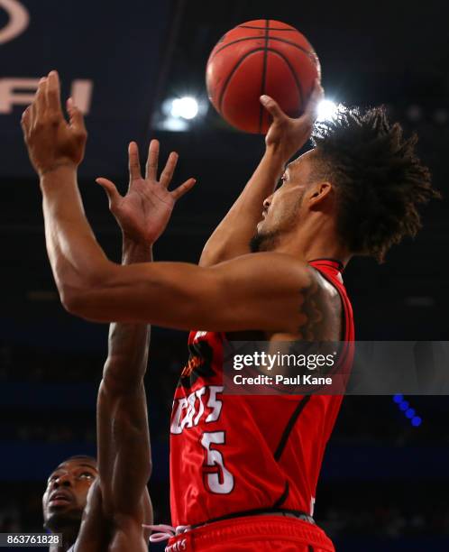 Jean-Pierre Tokoto of the Wildcats puts a shot up during the round three NBL match between the Perth Wildcats and Melbourne United at Perth Arena on...