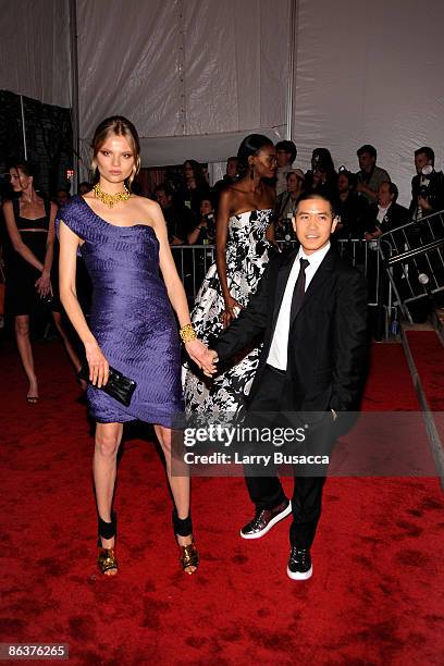 Magdalena Frackowiak and designer Thakoon Panichgul attend "The Model as Muse: Embodying Fashion" Costume Institute Gala at The Metropolitan Museum...