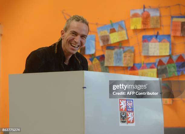 Ivan Bartos, chairman of the Czech pirate Party casts his ballot at a polling station during the first day of voting in the Czech elections on...