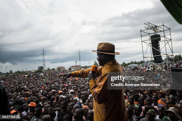 Opposition candidate Raila Odinga speaks to the crowd gathered at a rally at the Ogango Grounds on October 20, 2017 in Kisumu, Kenya. Tensions are...