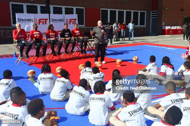 Mike Thibault of the Washington Mystics speaks with kids from Hendley Elementary school during a court dedication and Fit Clinic on October 17, 2017...