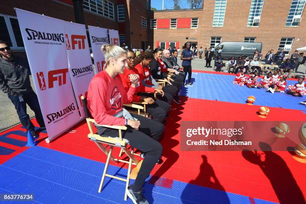 Elena Delle Donne of the Washington Mystics speaks with kids from Hendley Elementary school during a court dedication and Fit Clinic on October 17,...