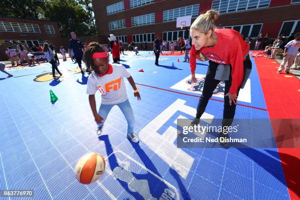 Elena Delle Donne of the Washington Mystics participates in a clinic at Hendley Elementary school during a court dedication and WNBA Fit Clinic on...