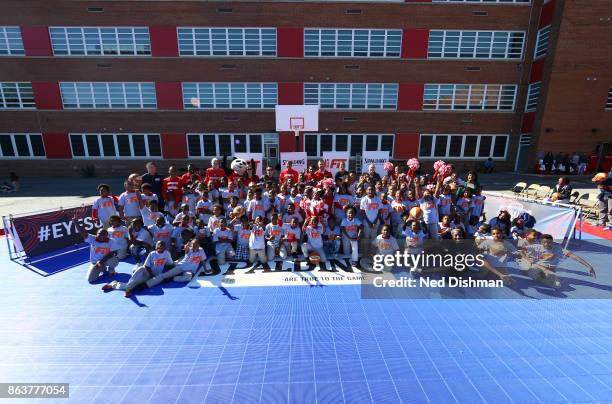 The Washington Mystics participates in a clinic at Hendley Elementary school during a court dedication and WNBA Fit Clinic on October 17, 2017 at...