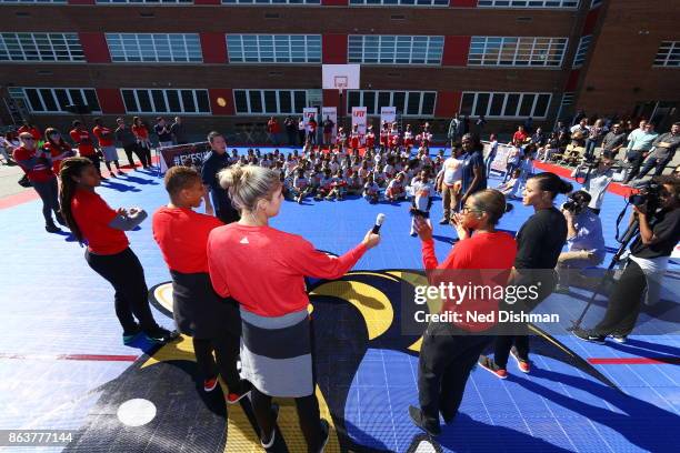 The Washington Mystics participates in a clinic at Hendley Elementary school during a court dedication and WNBA Fit Clinic on October 17, 2017 at...