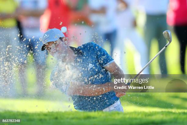 Sergio Garcia of Spain hits from a bunker on the 18th hole during day two of the Andalucia Valderrama Masters at Real Club Valderrama on October 20,...