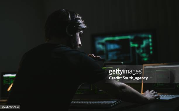 hacker doing banking crime - online threats stock pictures, royalty-free photos & images
