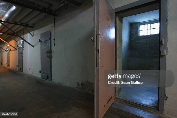 Prison cells stand with their doors open at the former prison of the East German, communist-era secret police, known as the Stasi, at...