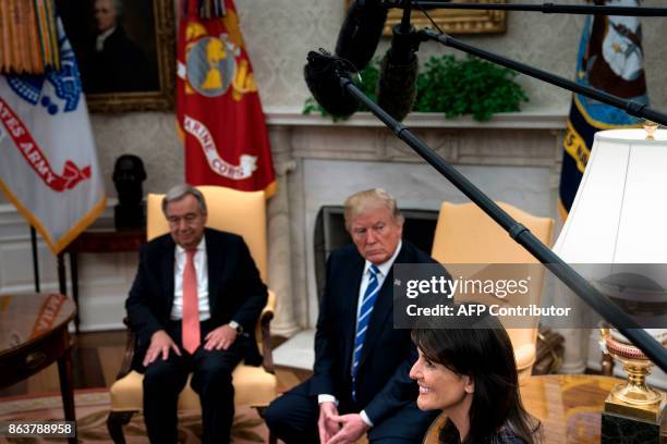 Secretary General Antonio Guterres , US President Donald Trump , and US Ambassador to the UN Nikki Haley wait for a meeting with other dignitaries in...