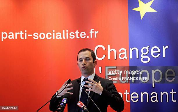 French socialist Party's spokesman Benoit Hamon speaks during a press conference, on May 5 in Paris, as French president Nicolas Sarkozy celebrates...