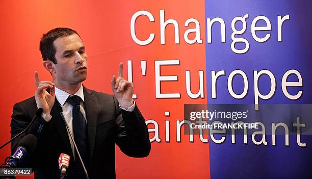 French socialist Party's spokesman Benoit Hamon gestures as he delivers a speech during a press conference, on May 5 in Paris, as French president...