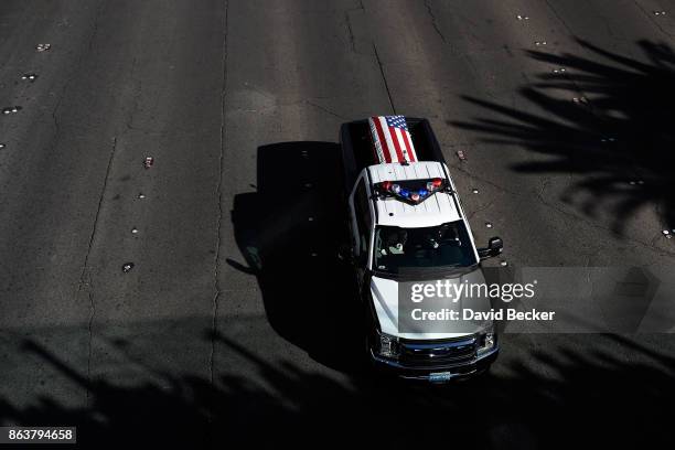 Motorcade on the Las Vegas Strip escorts the body of Las Vegas Metropolitan Police Department Officer Charleston Hartfield to his funeral on October...