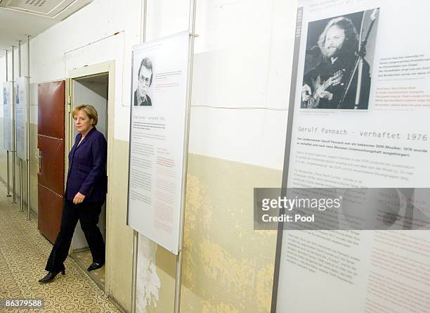 German Chancellor Angela Merkel visits the former prison of the East German, communist-era secret police, known as the Stasi, at Hohenschoenhausen on...