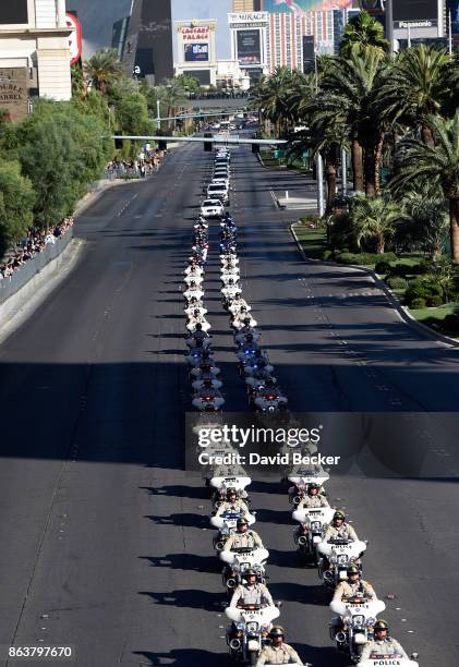 Motorcade on the Las Vegas Strip escorts the body of Las Vegas Metropolitan Police Department Officer Charleston Hartfield to his funeral on October...