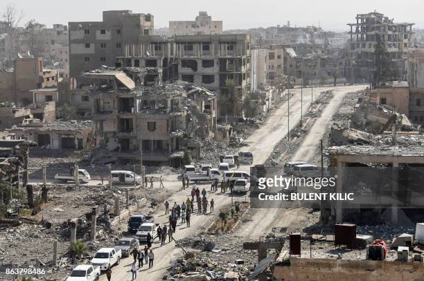 Picture taken on October 20 shows a general view of heavily damaged buildings in Raqa, after a Kurdish-led force expelled Islamic State group...