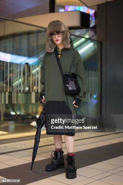 Guest is seen on the street attending Tokyo Fashion Week on October 20, 2017 in Tokyo, Japan.