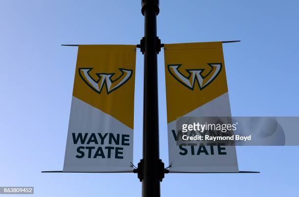 Wayne State banners hangs outside the Wayne State University cafe and bookstore in Detroit, Michigan on October 13, 2017.