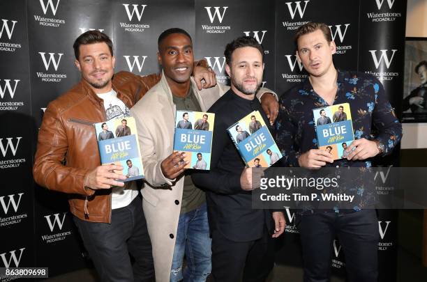 Duncan James, Simon Webbe, Anthony Costa and Lee Ryan from boy band Blue signing copies of the bands new book 'Blue: All Rise: Our Story' at...