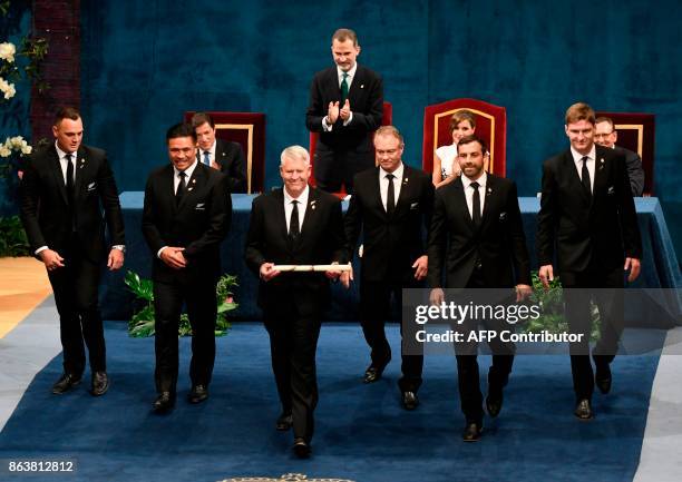 New Zealand All Blacks rugby players Israel Dagg and Keven Mealamu, manager Steve Tew, former player Grant Fox, players Conrad Smith and Jordie...