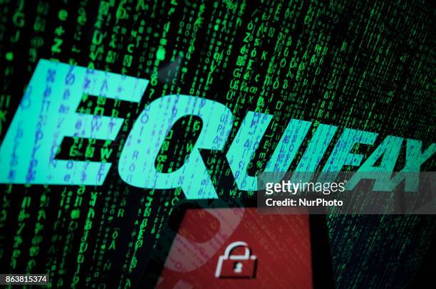 An Equifax logo is seen in this photo illustration on 20 October, 2017. The consumer credit reporting agency was hacked twice in 2017. In the last...