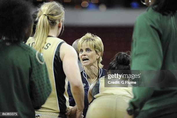 Head coach Kim Mulkey of the Baylor Bears talks to her team during the game against the Louisville Cardinals during an NCAA Tournament game on March...