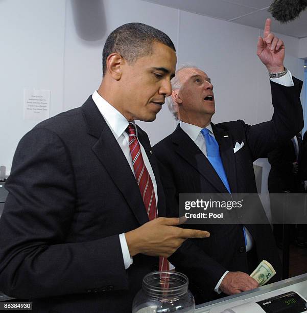 President Barack Obama and U.S. Vice President Joe Biden order lunch at Ray's Hell Burger May 5, 2009 in Arlington, Virginia. Obama and Biden made an...