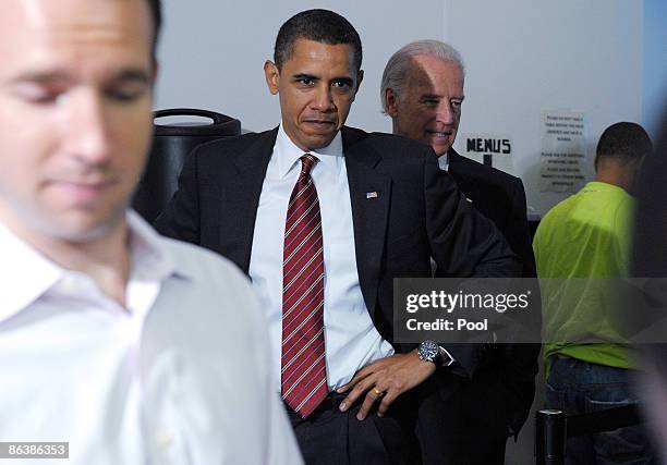 President Barack Obama a nd Vice President Joe Biden stand in line before ordering lunch at Ray's Hell Burger May 5, 2009 in Arlington, Virginia....