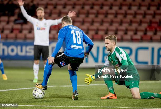 Gabriel Gudmundsson of Halmstad BK , Oscar Jansson of Orebro SK during the Allsvenskan match between Orebro SK and Halmstad BK at Behrn Arena on...