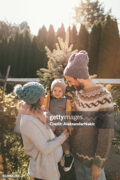 winter family portrait - tree plantation stock pictures, royalty-free photos & images