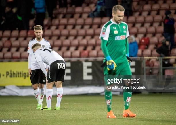 Martin Lorentzson & Michael Almeback & Oscar Jansson of Orebro SK is dejected during the Allsvenskan match between Orebro SK and Halmstad BK at Behrn...