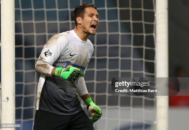 Goalkeeper Janis Blaswich of Rostock gestures during the third league match between FC Hansa Rostock and VfL Osnabrueck at Ostseestadion on October...