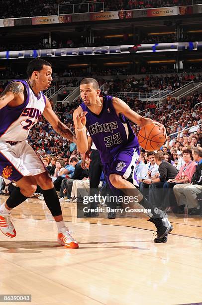 Francisco Garcia of the Sacramento Kings makes a move to the basket against Matt Barnes of the Phoenix Suns during the game at US Airways Center on...