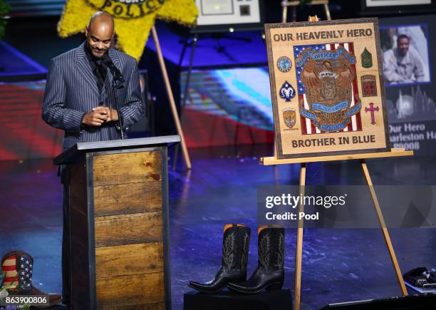 Carl Hartfield Jr. Speaks during a funeral for his brother Las Vegas police officer Charleston Hartfield, October 20, 2017 in Henderson, Nevada....