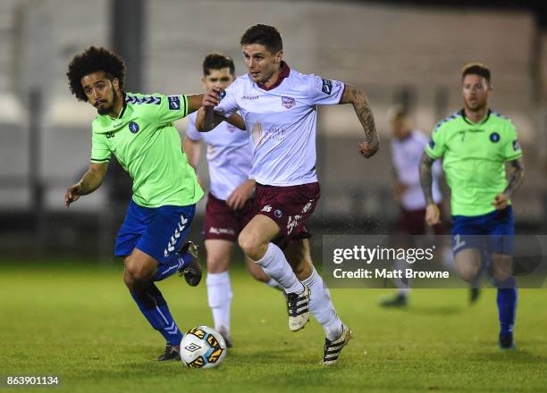 Limerick , Ireland - 20 October 2017; Gavan Holohan of Galway United in action against Bastien Hery of Limerick FC during the SSE Airtricity League...