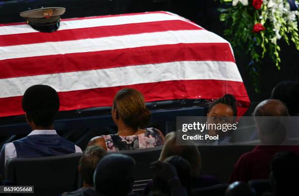 Savannah Hartfield, right, looks back at the audience during a funeral for her father Las Vegas police officer Charleston Hartfield, October 20, 2017...