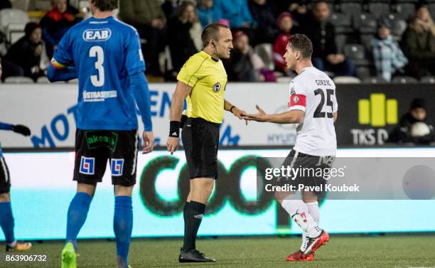 Ref. Kaspar Sjöberg & Nordin Gerzic of Orebro SK during the Allsvenskan match between Orebro SK and Halmstad BK at Behrn Arena on October 20, 2017 in...