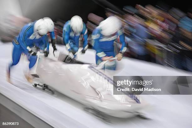 bobsled competition start. - bobsleigh team stock pictures, royalty-free photos & images