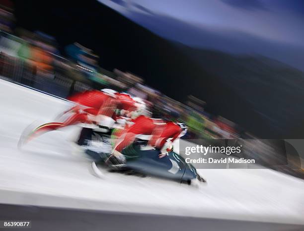 bobsled competition start. - bobsleigh team stock pictures, royalty-free photos & images