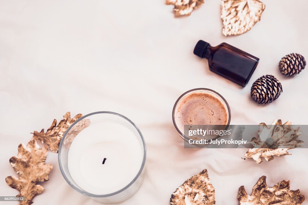 Fall spa beauty products flatlay on white