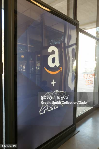 Sign advertising the partnership between Amazon.com and UC Berkeley, featuring the Amazon logo and the Cal Bear, at UC Berkeley in Berkeley,...