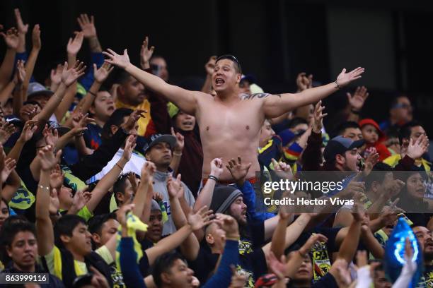 Fan of America cheers during the 10th round match between America and Chivas as part of the Torneo Apertura 2017 Liga MX at Azteca Stadium on October...