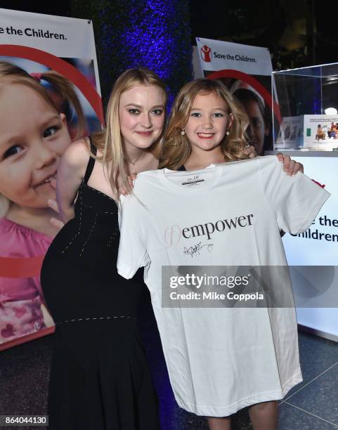 Actress and Save the Children Ambassador Dakota Fanning and Save the Children beneficiary Anna Marie attend the 5th Annual Save the Children...