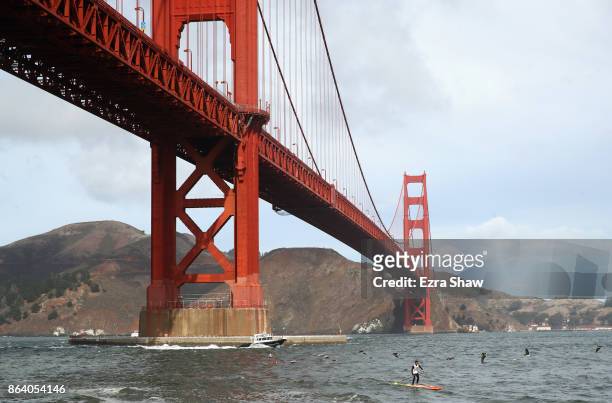 Kai Lenny competes in the Red Bull Heavy Water event at Ocean Beach on October 20, 2017 in San Francisco, California. The 7.5 mile course went from...