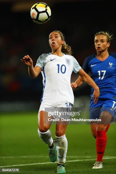 Jordan Nobbs of England battles for the ball with Marion Torrent of France during the International friendly match between France and England held at...